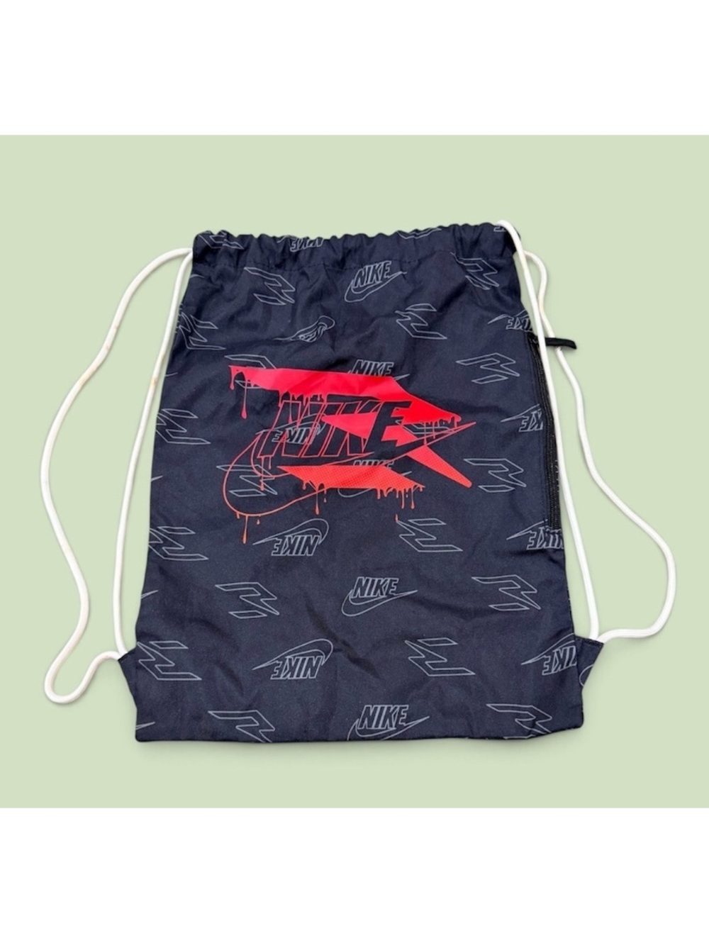 Nike Black Drawstring Backpack with Red Drip Logo